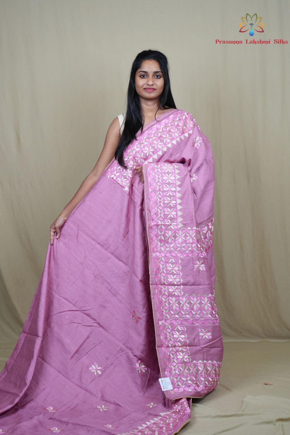 Semi Tussar silk saree with all-over thread embroidered motifs and beautiful borders.
