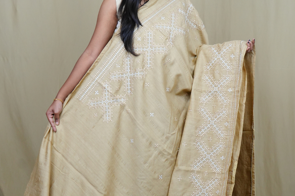 Traditional semi Tussar saree suitable for festive occasions with intricate Kutch work detailing.