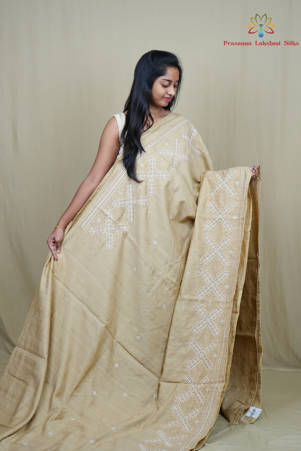 Traditional semi Tussar saree suitable for festive occasions with intricate Kutch work detailing.