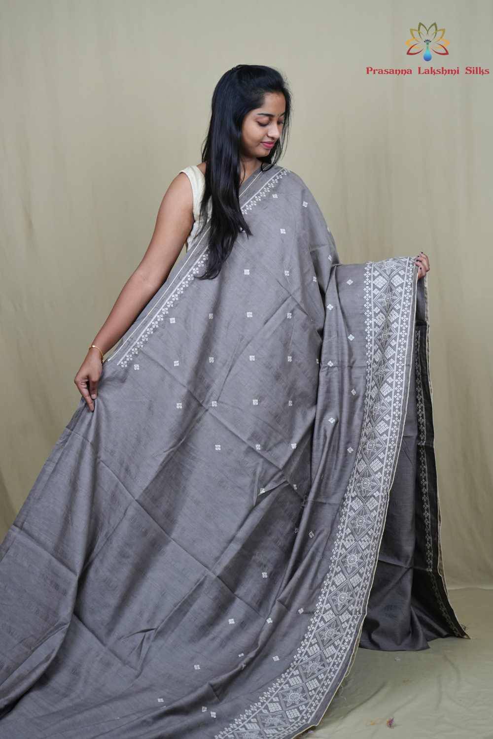 Traditional semi Tussar saree suitable for festive occasions with intricate Kutch work detailing.