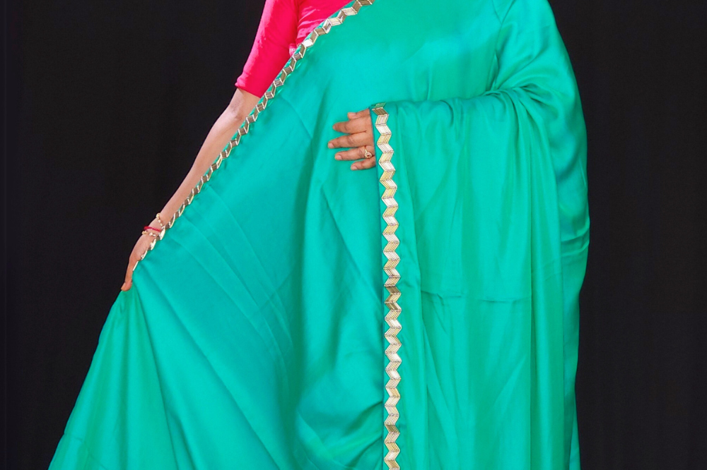 Sea green crepe satin sarees for parties