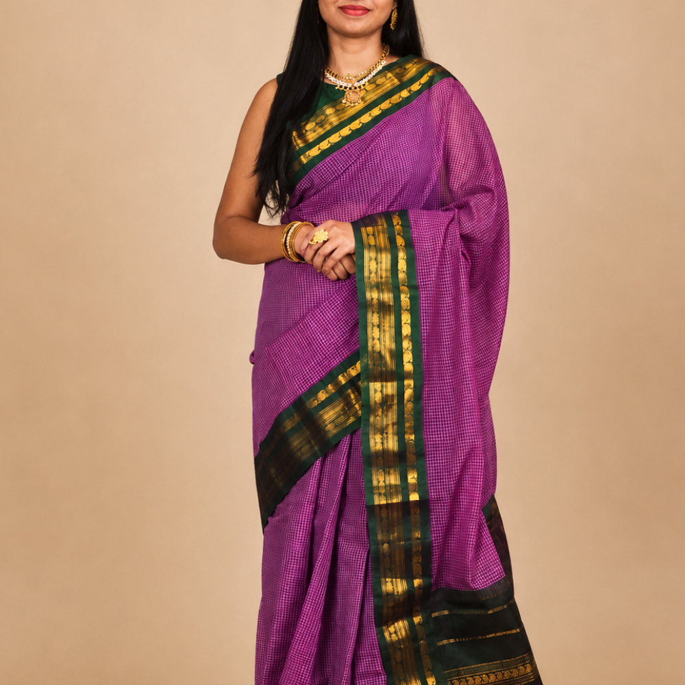 Pure handloom Gadwal cotton saree with traditional zari woven borders and simple zari stripes pallu.
