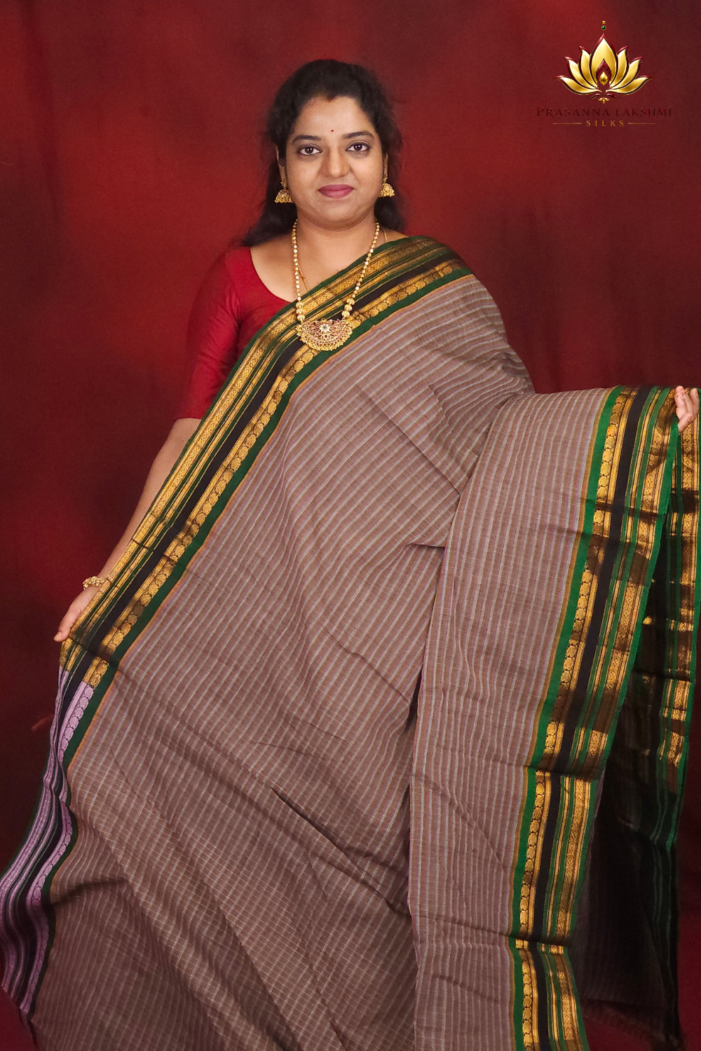 Lightweight Gadwal cotton saree featuring elegant zari border and striped pallu design.
