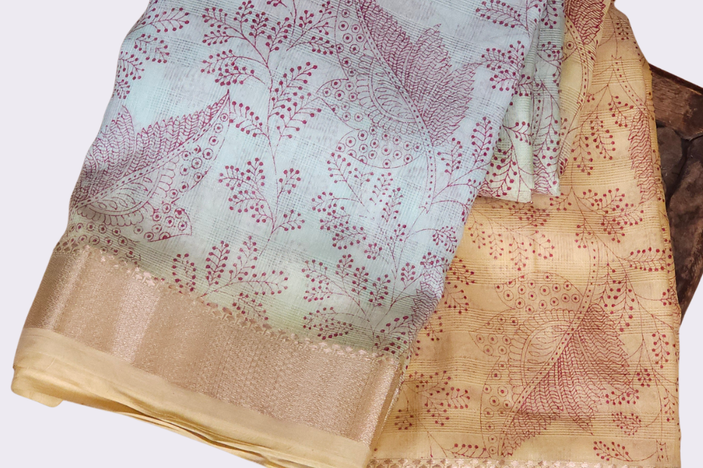 Elegant  dual colour linen saree with floral print and matching plain blouse piece.