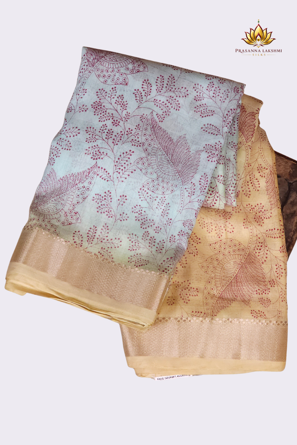 Elegant  dual colour linen saree with floral print and matching plain blouse piece.