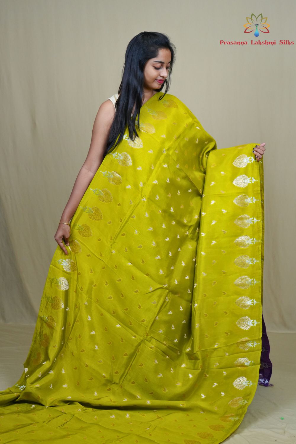 Traditional Banarasi silk saree featuring rich brocade pallu and matching brocade blouse.
