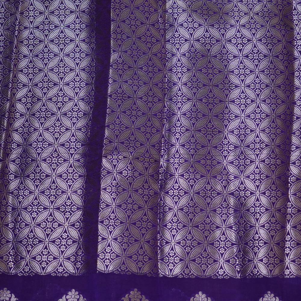 Elegant Banarasi Munga silk saree suitable for weddings and grand celebrations with intricate zari detailing.
