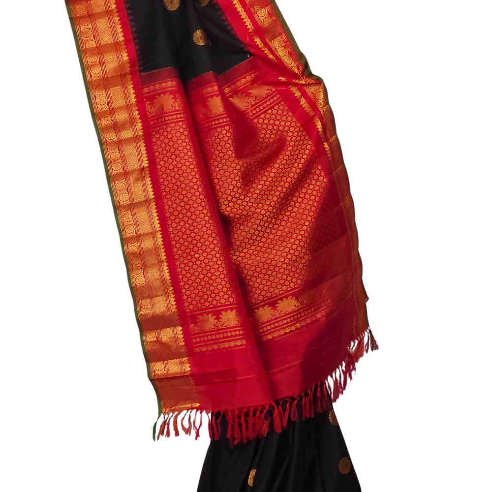 Black Handloom Gadwal Pure Silk Saree with rich red zari woven border and brocade pallu

