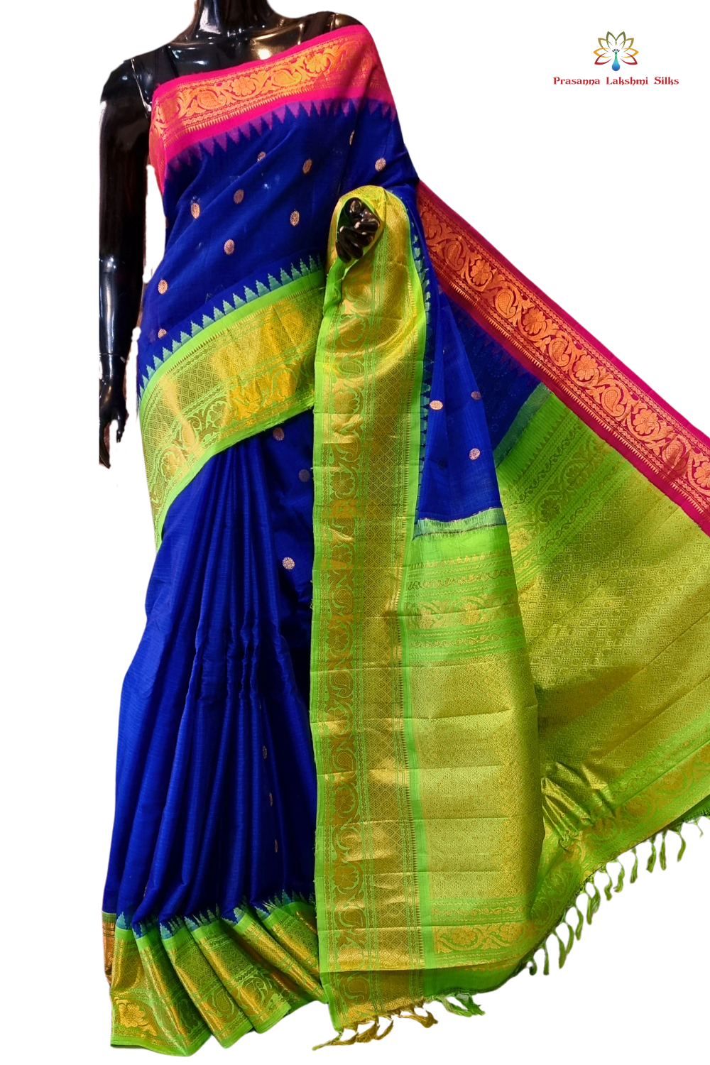 Handloom Gadwal silk cotton saree with all-over zari buttis and rich brocade pallu.

