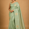 Pure handloom Gadwal silk saree with all-over zari motifs and intricate turning borders
