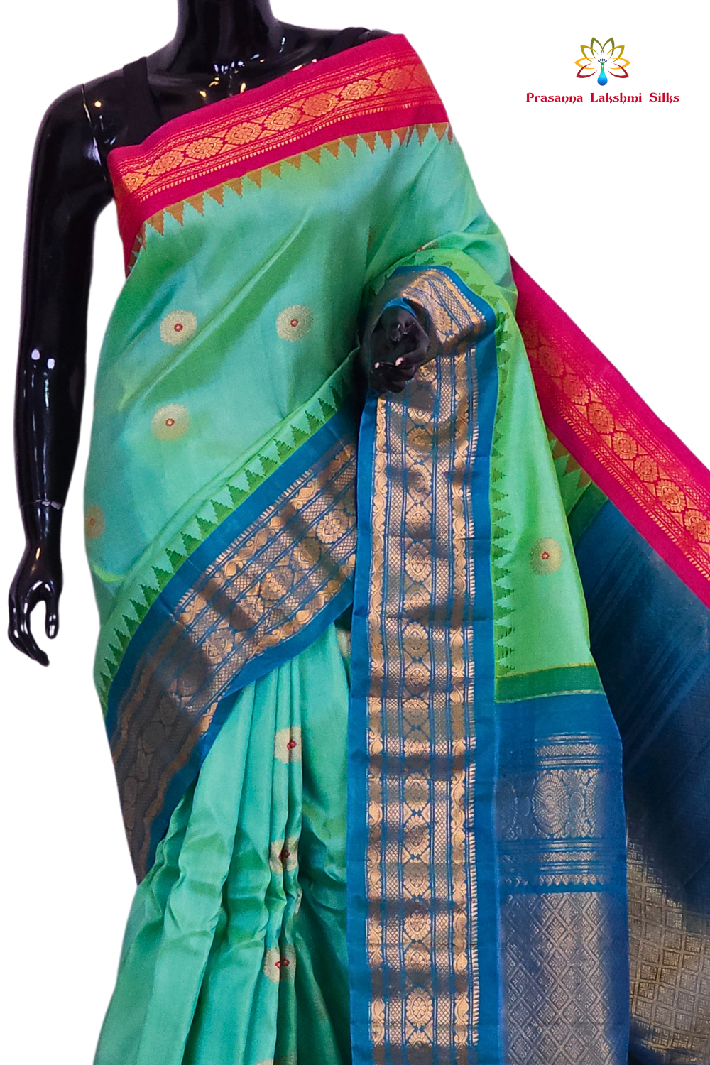 Close-up of the rich zari-woven brocade pallu on a handloom sea green pure silk Gadwal saree, highlighting the precise craftsmanship of the weave.