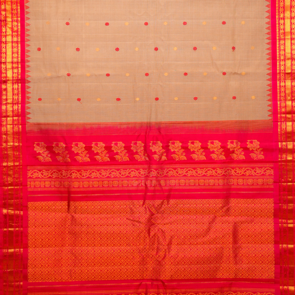 Traditional Gadwal SiCo saree featuring exquisite zari woven borders and blouse piece.
