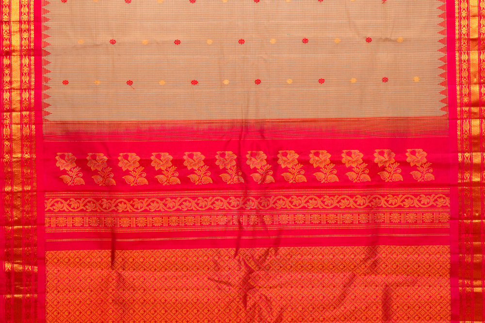 Traditional Gadwal SiCo saree featuring exquisite zari woven borders and blouse piece.
