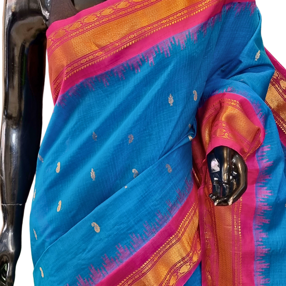 Traditional Gadwal SiCo saree featuring exquisite zari woven borders and blouse piece.
