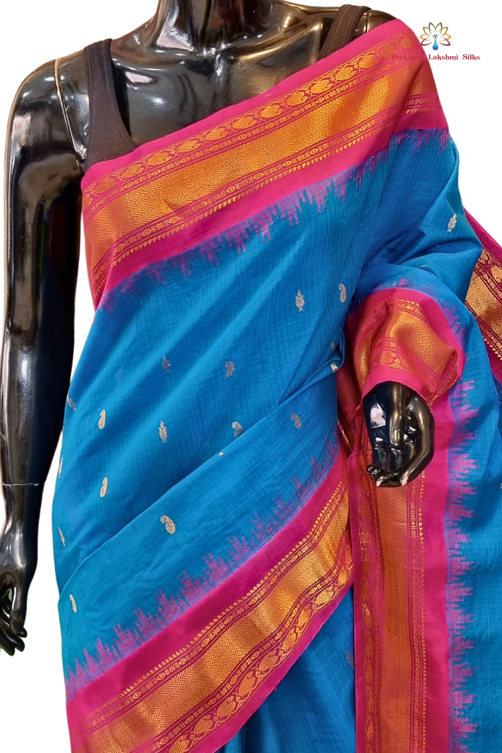 Traditional Gadwal SiCo saree featuring exquisite zari woven borders and blouse piece.
