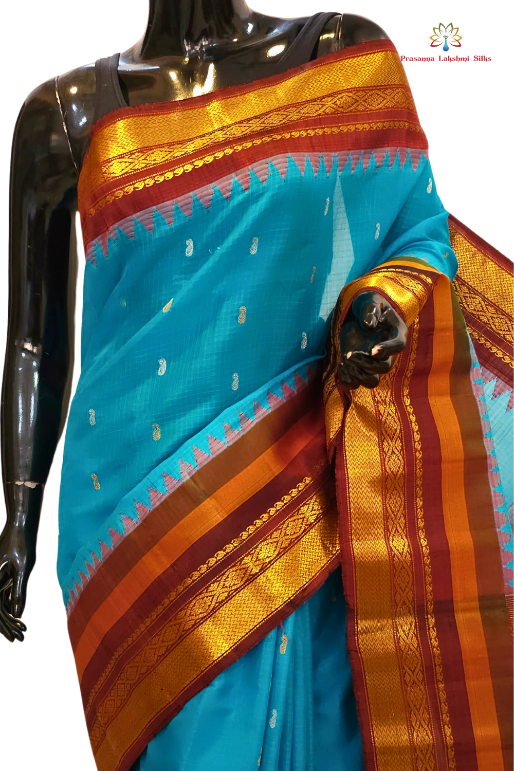 Traditional Gadwal SiCo saree featuring exquisite zari woven borders and blouse piece.
