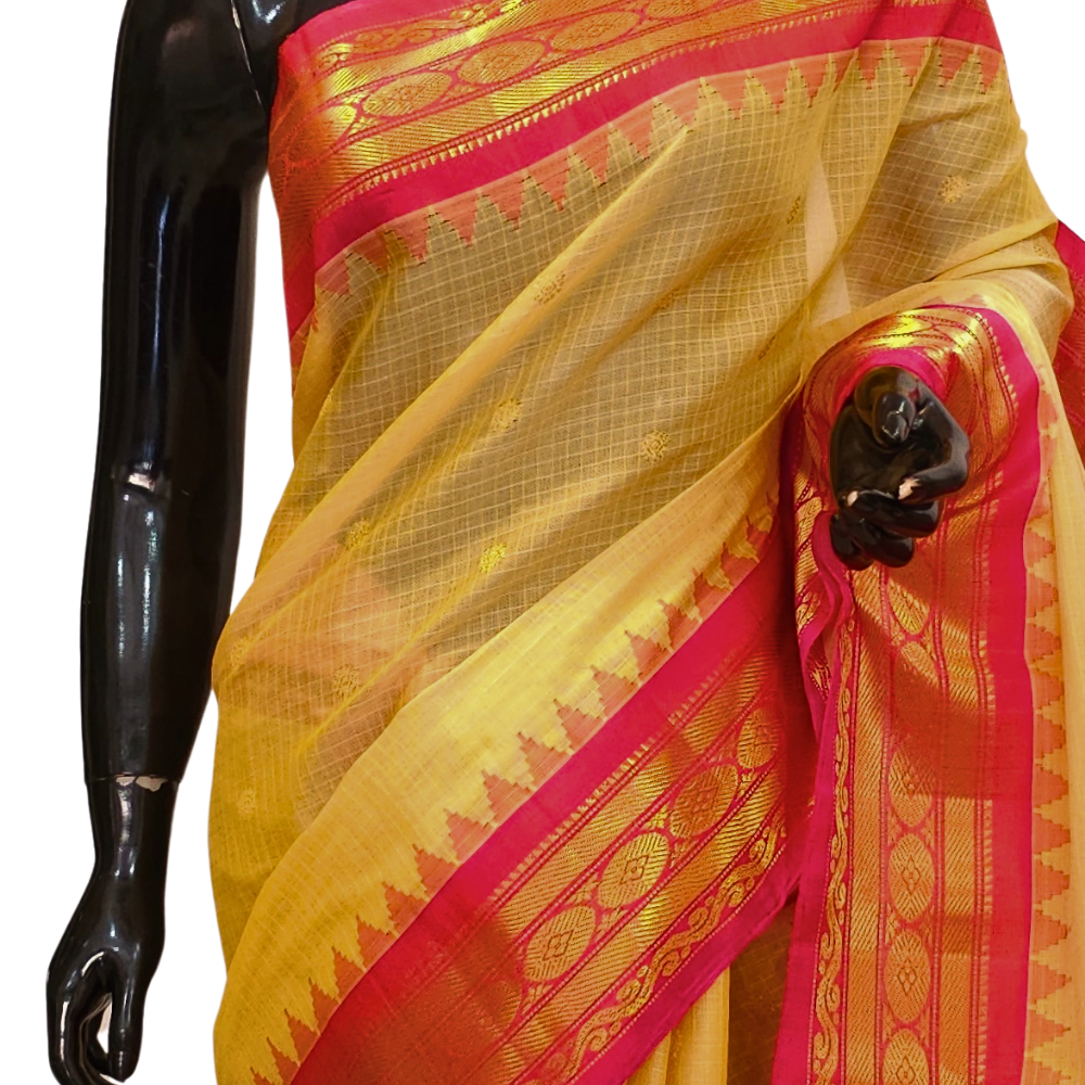 Traditional Gadwal SiCo saree featuring exquisite zari woven borders and blouse piece.
