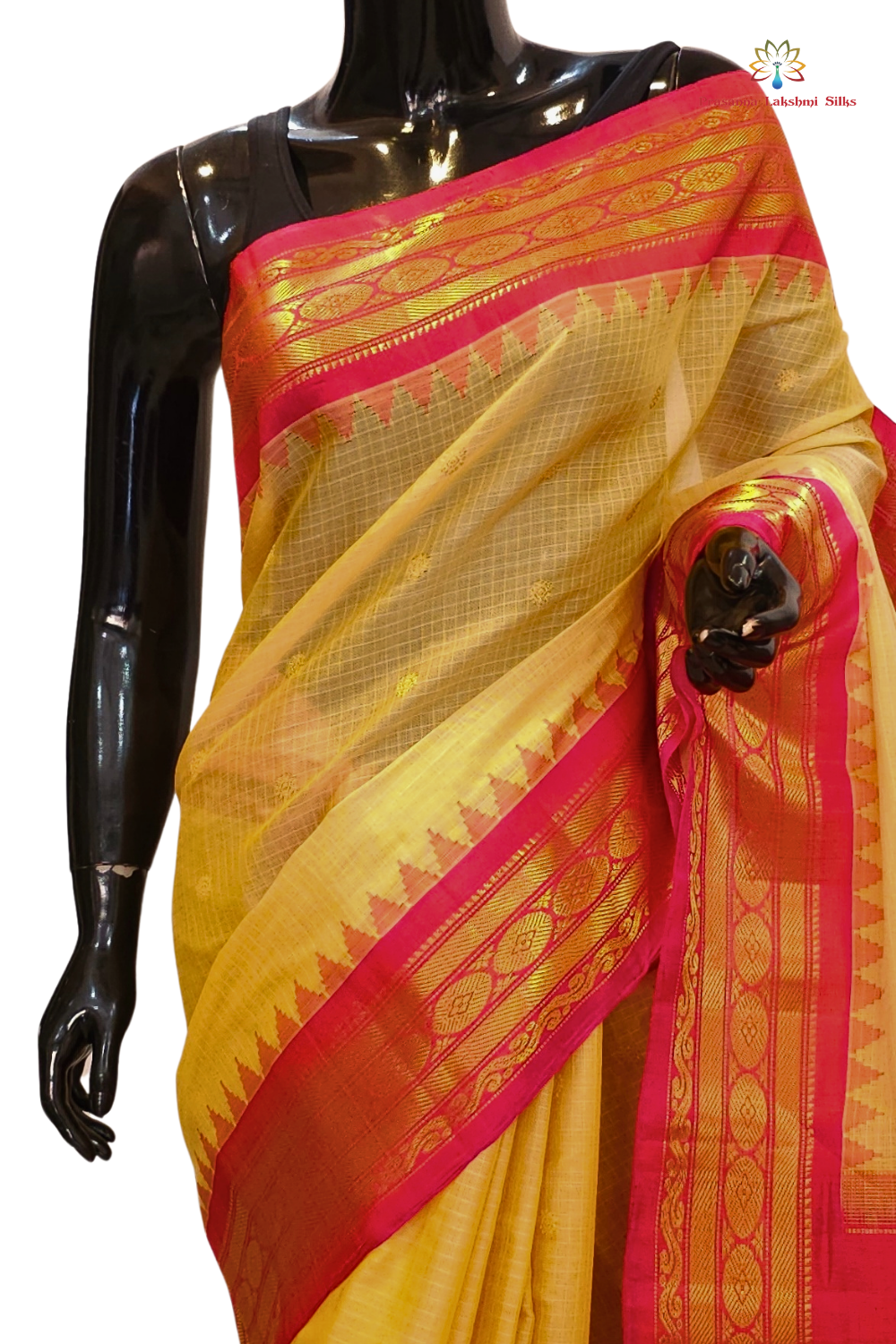 Traditional Gadwal SiCo saree featuring exquisite zari woven borders and blouse piece.

