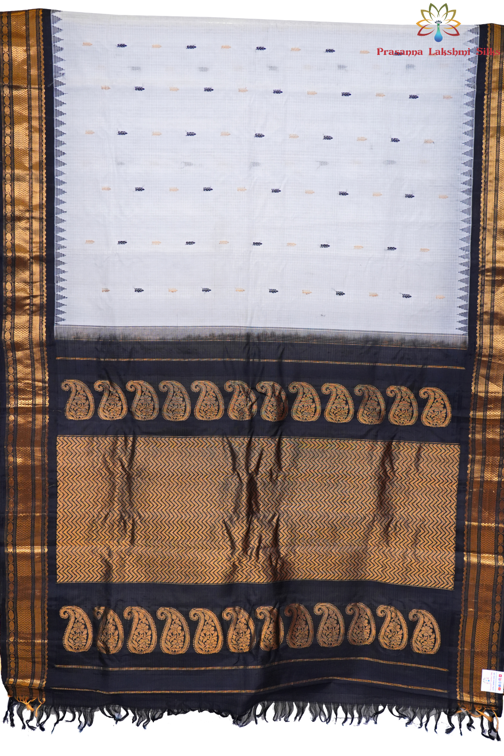 Traditional Gadwal SiCo saree featuring exquisite zari woven borders and blouse piece.
