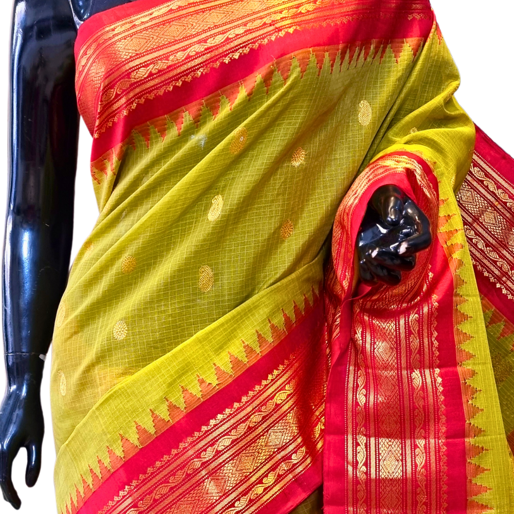 Traditional Gadwal SiCo saree featuring exquisite zari woven borders and blouse piece.
