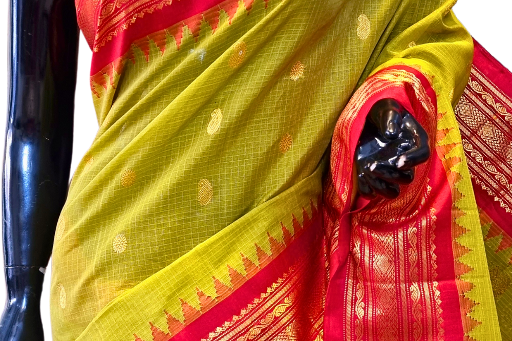 Traditional Gadwal SiCo saree featuring exquisite zari woven borders and blouse piece.
