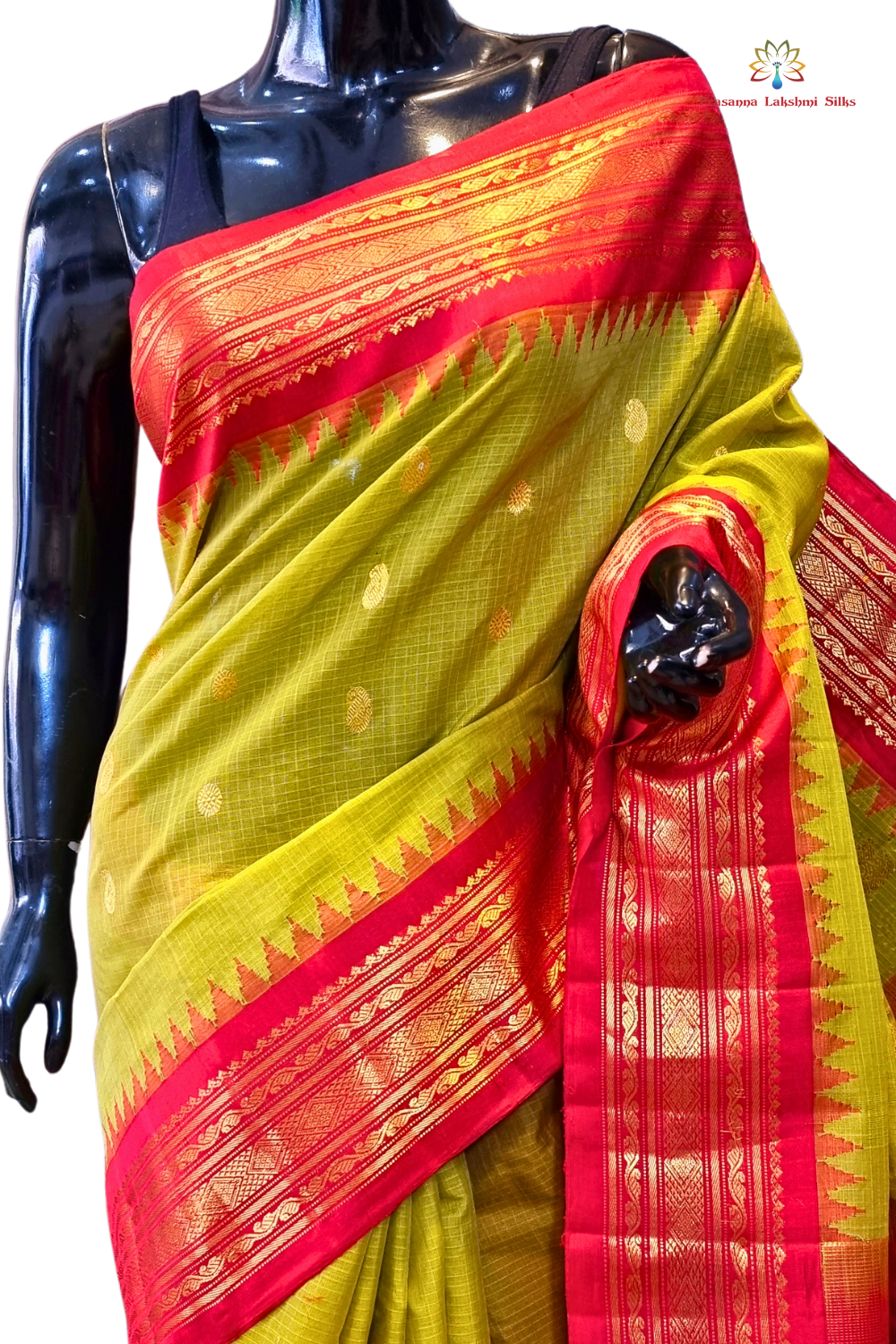 Traditional Gadwal SiCo saree featuring exquisite zari woven borders and blouse piece.
