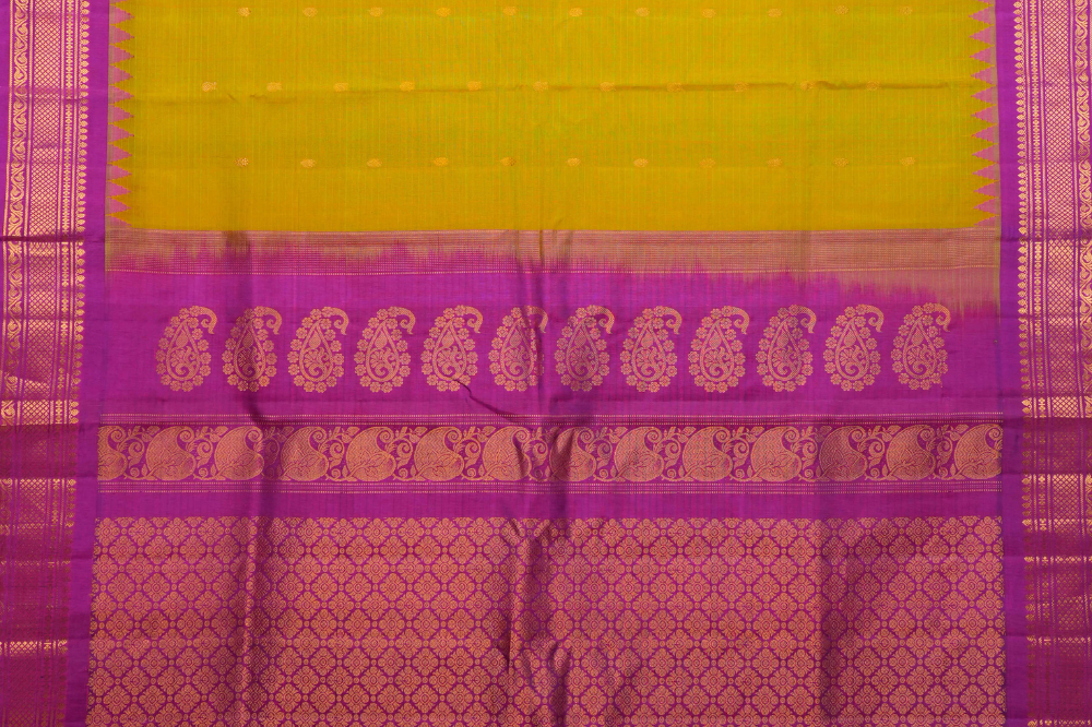 Traditional Gadwal SiCo saree featuring exquisite zari woven borders and blouse piece.
