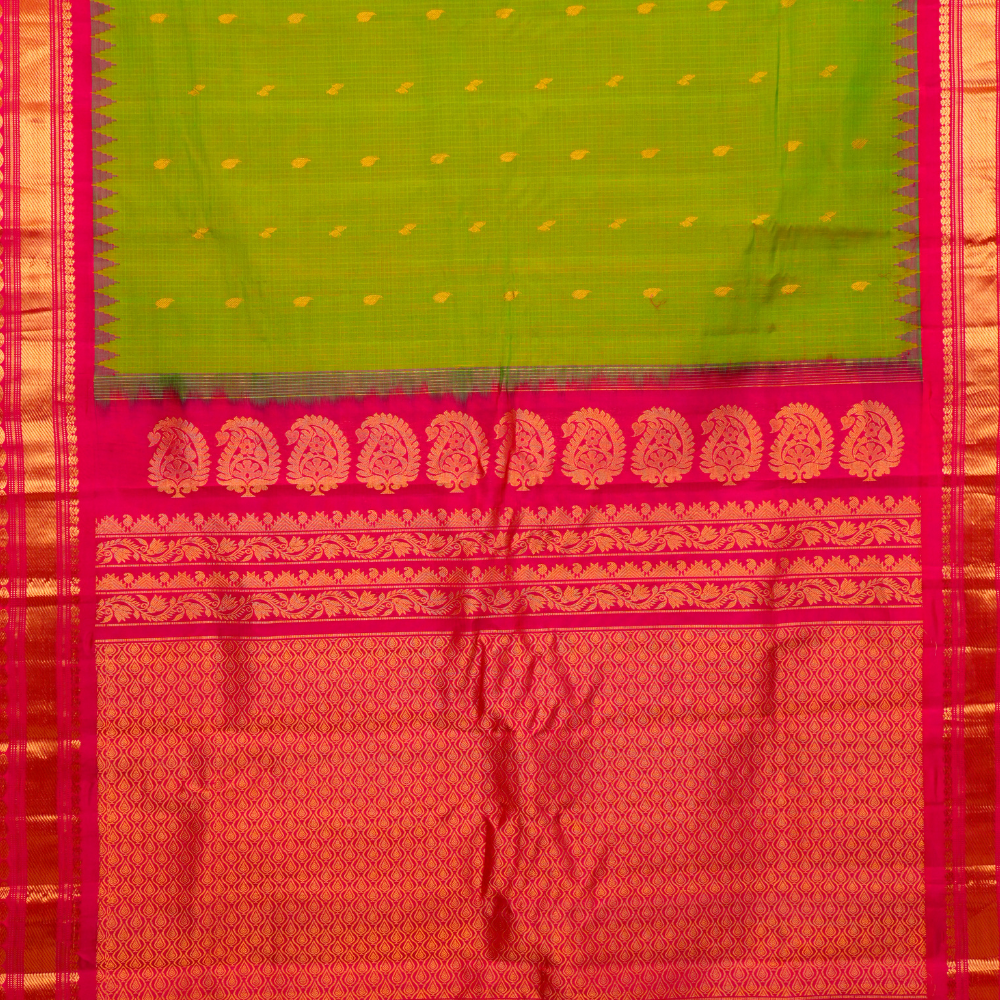 Traditional Gadwal SiCo saree featuring exquisite zari woven borders and blouse piece.
