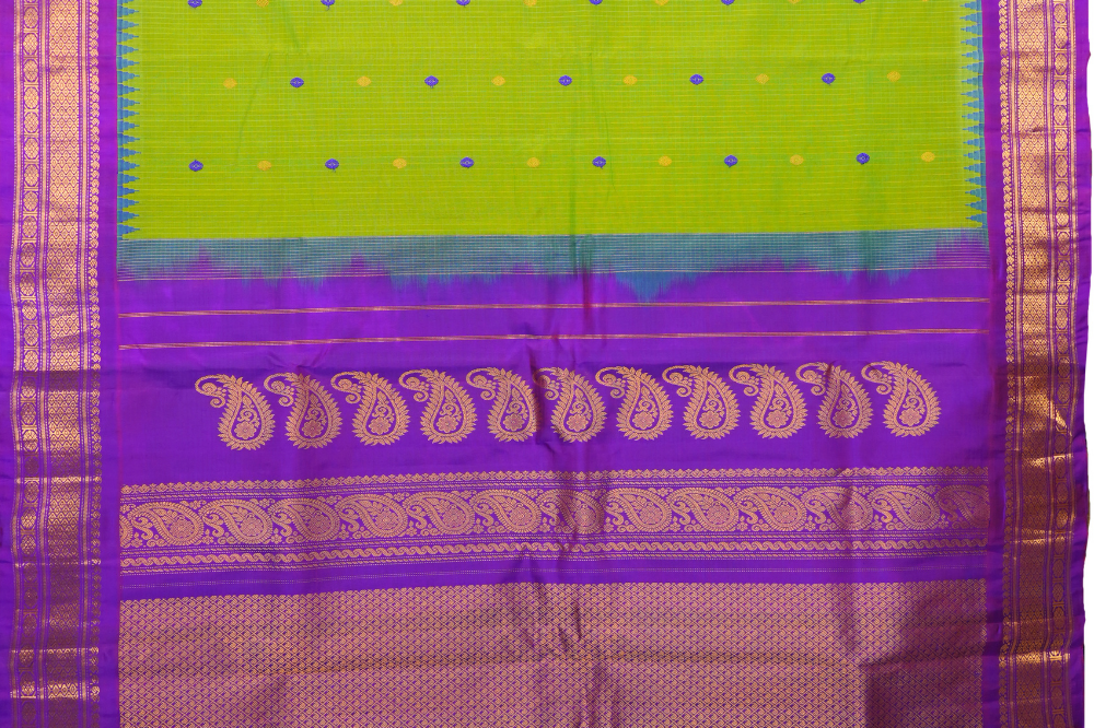 Traditional Gadwal SiCo saree featuring exquisite zari woven borders and blouse piece.
