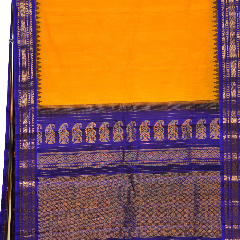 Traditional Gadwal SiCo saree featuring exquisite zari woven borders and blouse piece.

