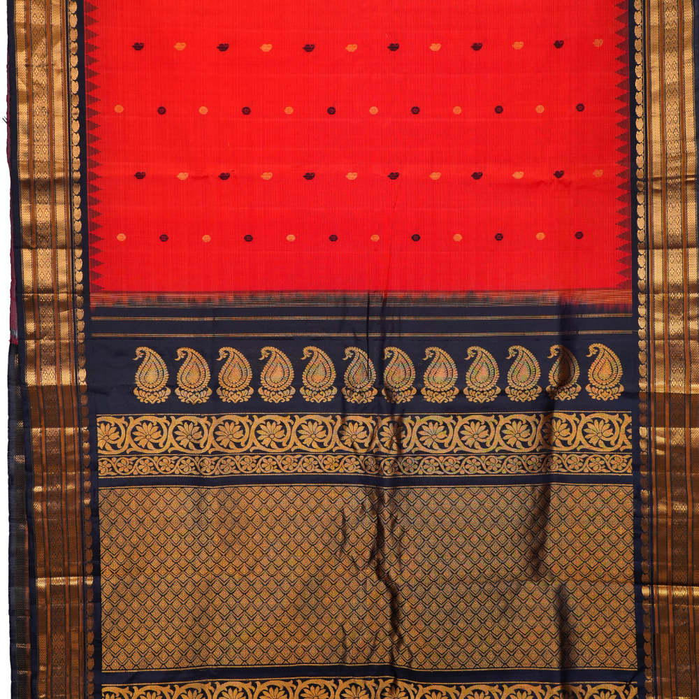 Traditional Gadwal SiCo saree featuring exquisite zari woven borders and blouse piece.

