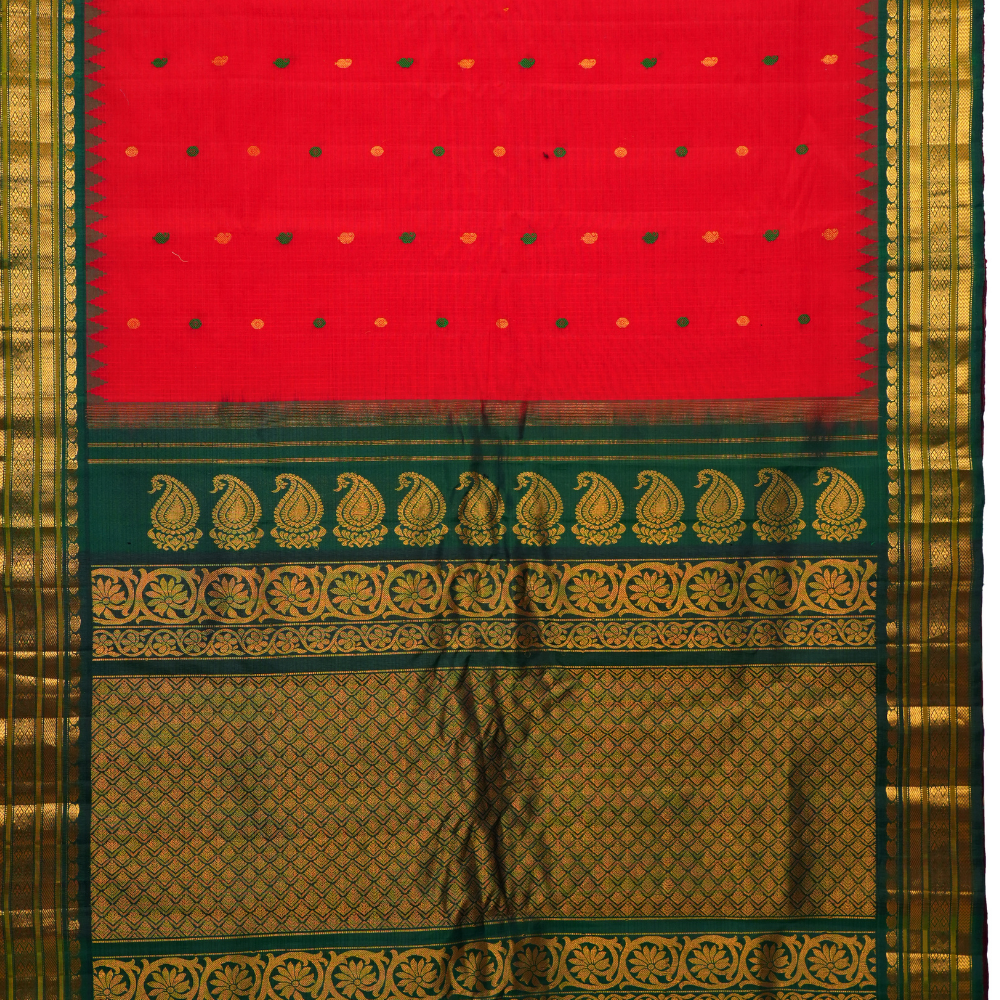 Traditional Gadwal SiCo saree featuring exquisite zari woven borders and blouse piece.
