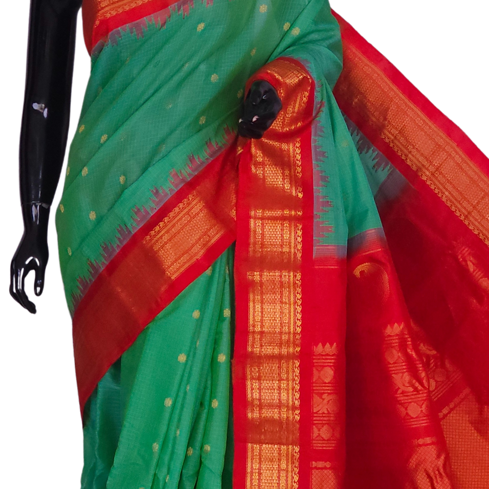 Traditional Gadwal SiCo saree featuring exquisite zari woven borders and blouse piece.
