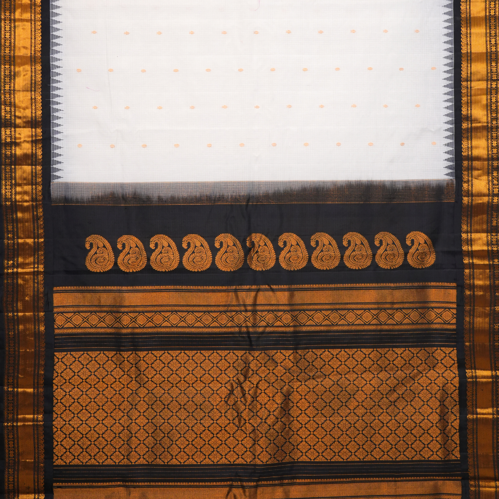 Traditional Gadwal SiCo saree featuring exquisite zari woven borders and blouse piece.
