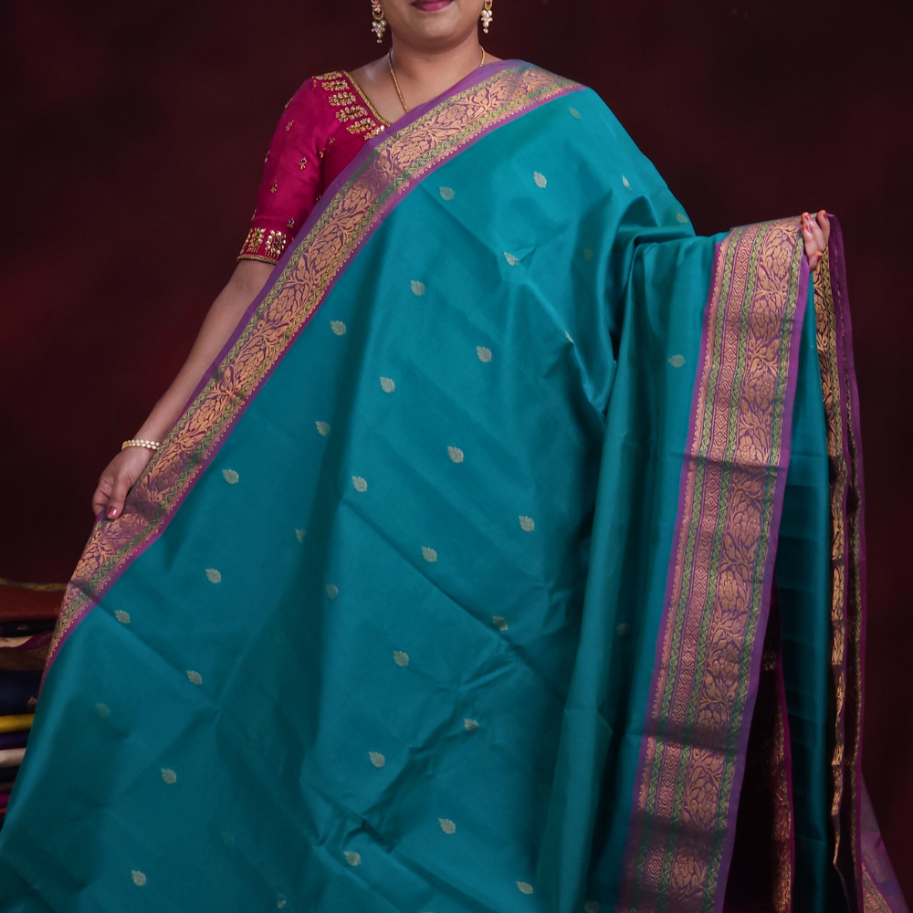 Close-up of zari motif detailing on Rama Green Gadwal saree