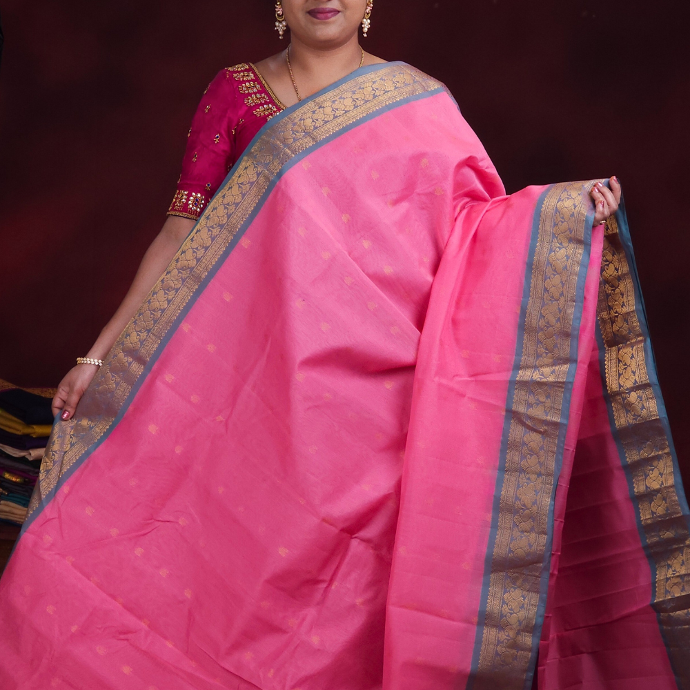 Close-up of zari motif detailing on baby pink handloom Gadwal saree