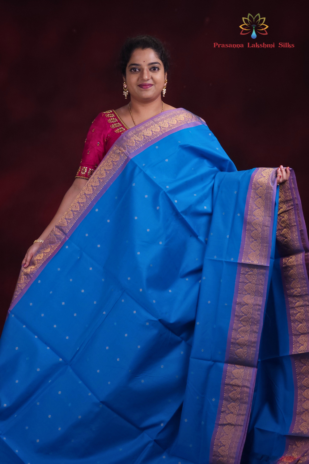 Close-up of zari motif detailing on copper sulphate blue Gadwal saree