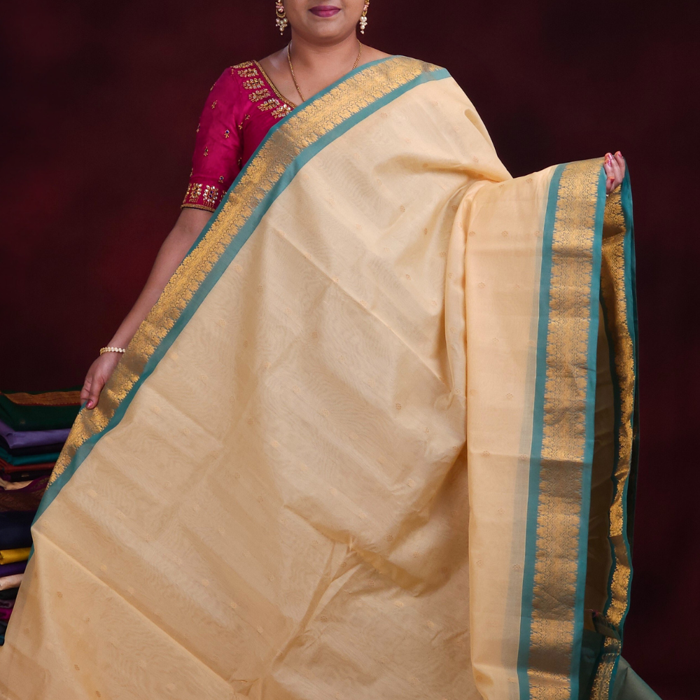 Close-up of zari motif detailing on cream Gadwal saree