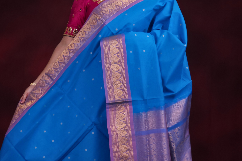 Copper sulphate blue Gadwal silk cotton saree with lilac zari-woven border