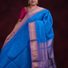 Copper sulphate blue Gadwal silk cotton saree with lilac zari-woven border