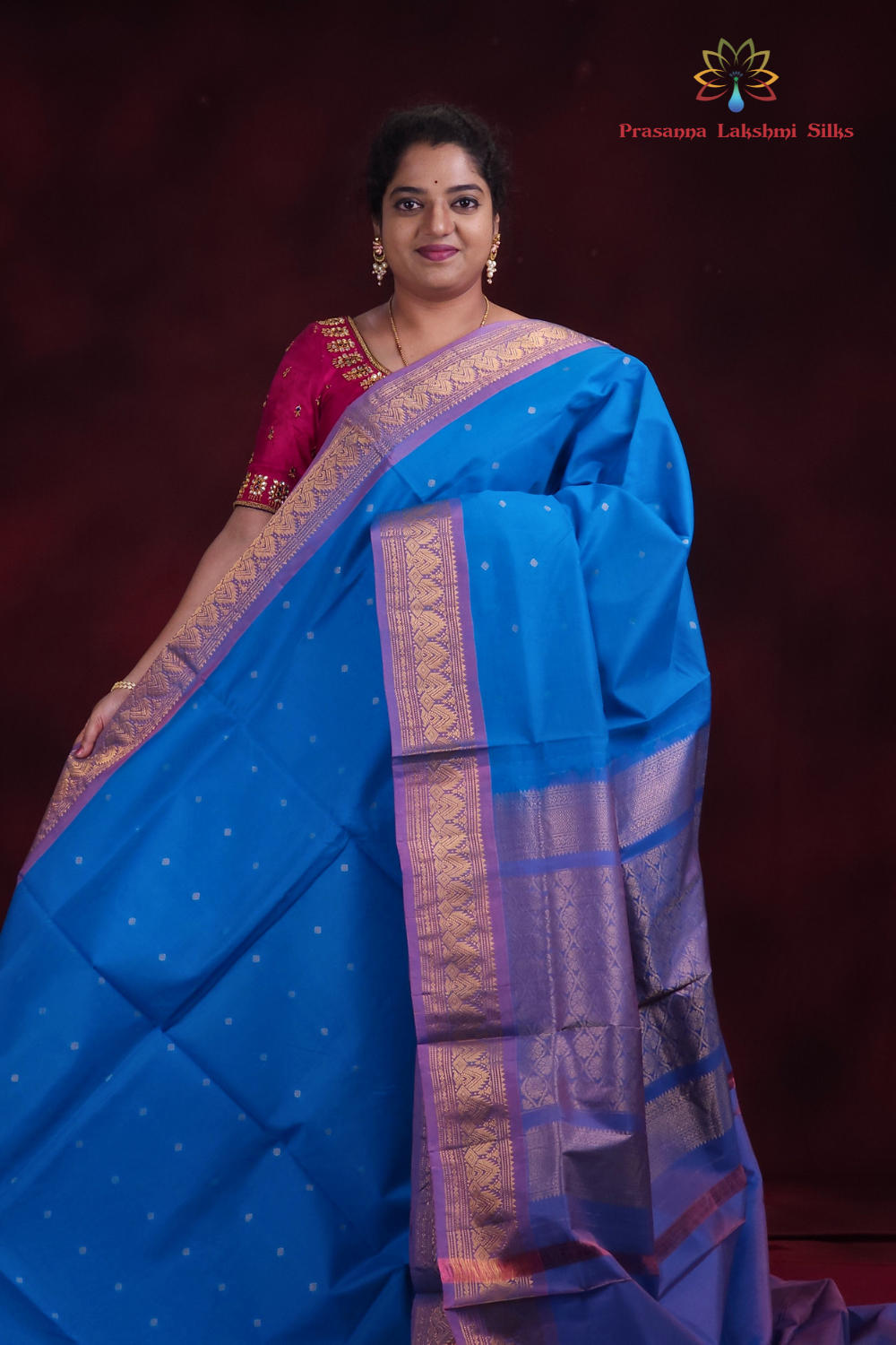Copper sulphate blue Gadwal silk cotton saree with lilac zari-woven border