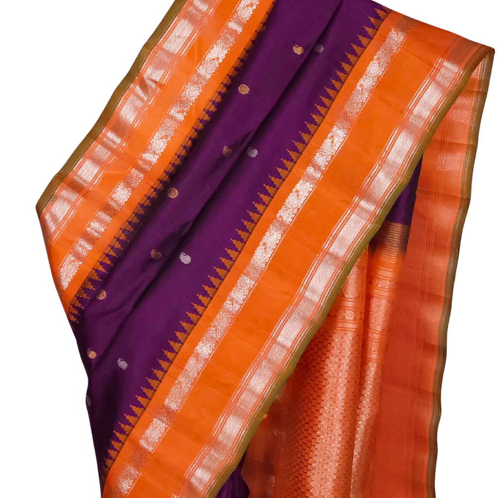 Deep Violet Handloom Gadwal Pure Silk Saree with rich orange zari woven border and brocade pallu

