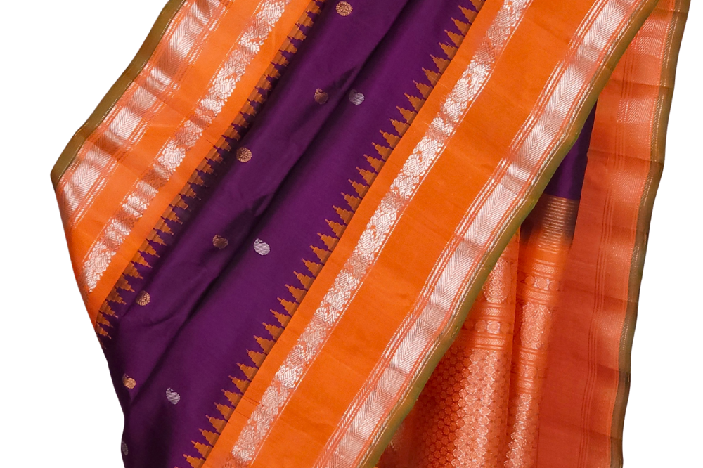 Deep Violet Handloom Gadwal Pure Silk Saree with rich orange zari woven border and brocade pallu

