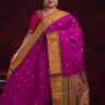 Deep magenta Gadwal silk cotton saree with olive green zari-woven border