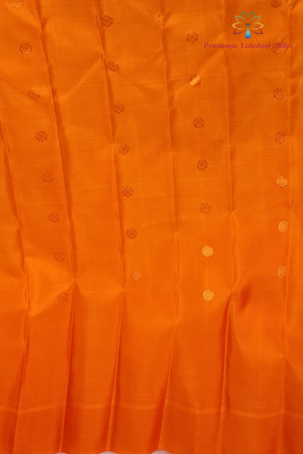 Elegant Peacock Green pure silk Gadwal saree with orange blouse piece from Prasanna Lakshmi Silks

