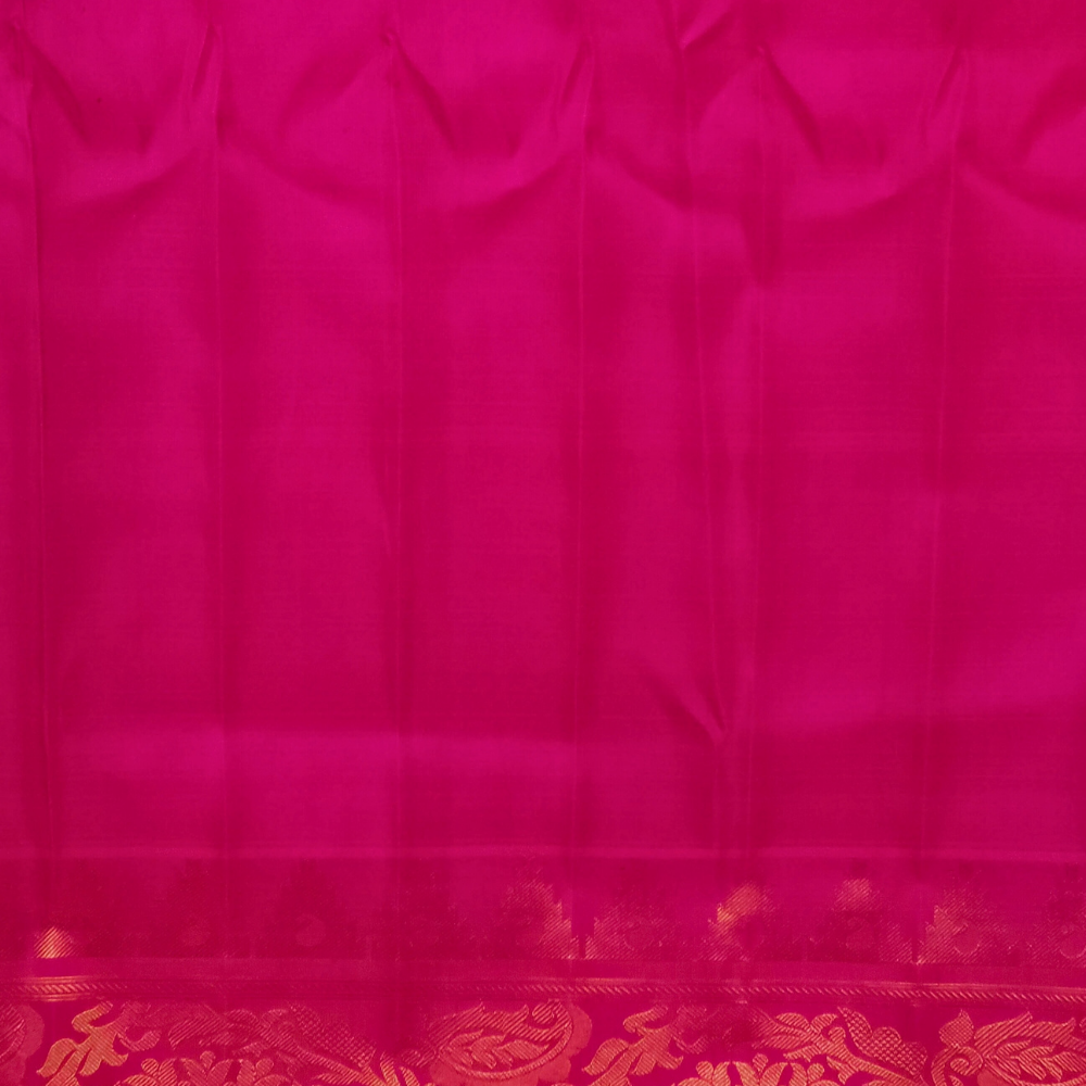 Elegant Telugu traditional Gadwal silk saree in deep purple with pink blouse piece

