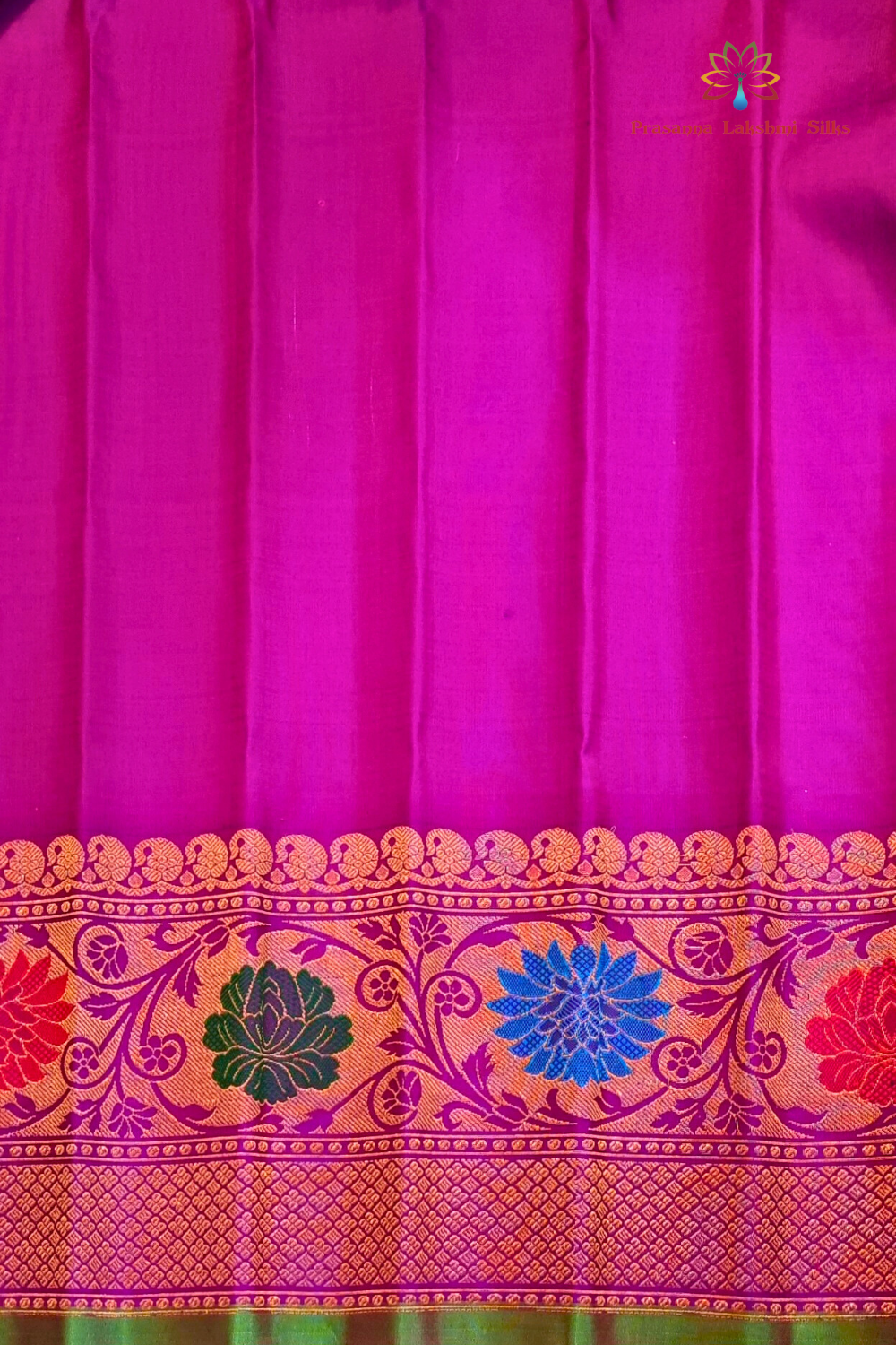 Elegant Telugu traditional Gadwal silk saree in dual shade green purple with matching purple blouse

