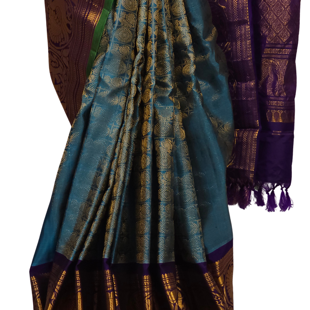 Elegant Telugu traditional Gadwal silk saree in light blue with dark blue blouse piece

