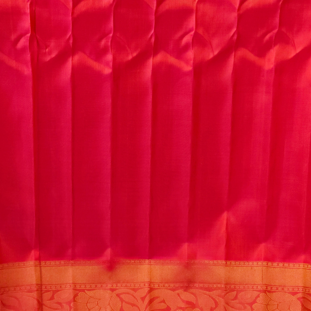 Elegant Telugu traditional Gadwal silk saree in mango yellow with pink blouse piece

