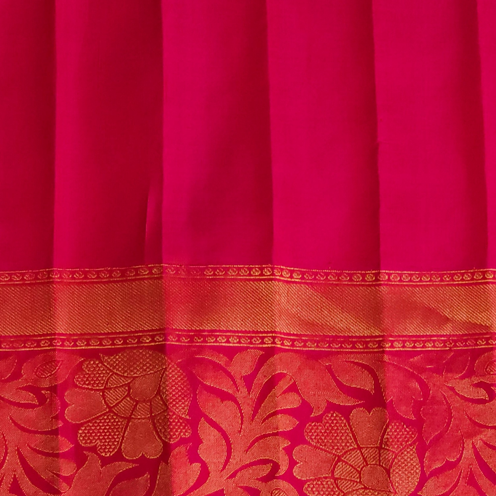 Elegant Telugu traditional Gadwal silk saree in mango yellow with pink blouse piece

